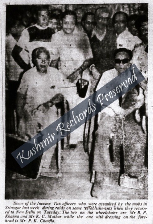 Three injured Income-Tax officers photographed after the 1981 Srinagar raids, with two officers in wheelchairs and another wearing a head dressing.